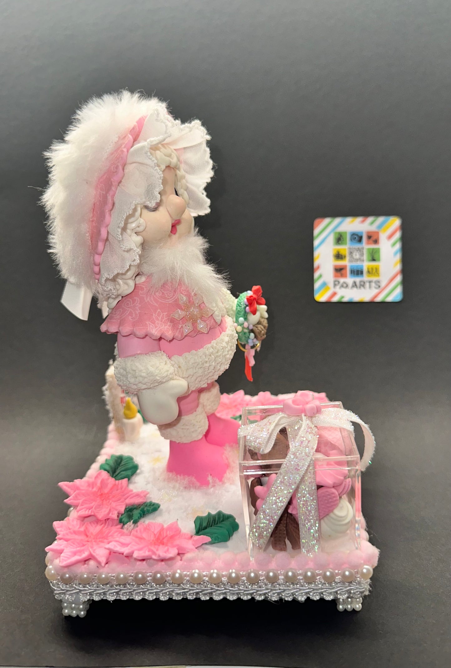 Decorative figurine “Christmas doll in pink”