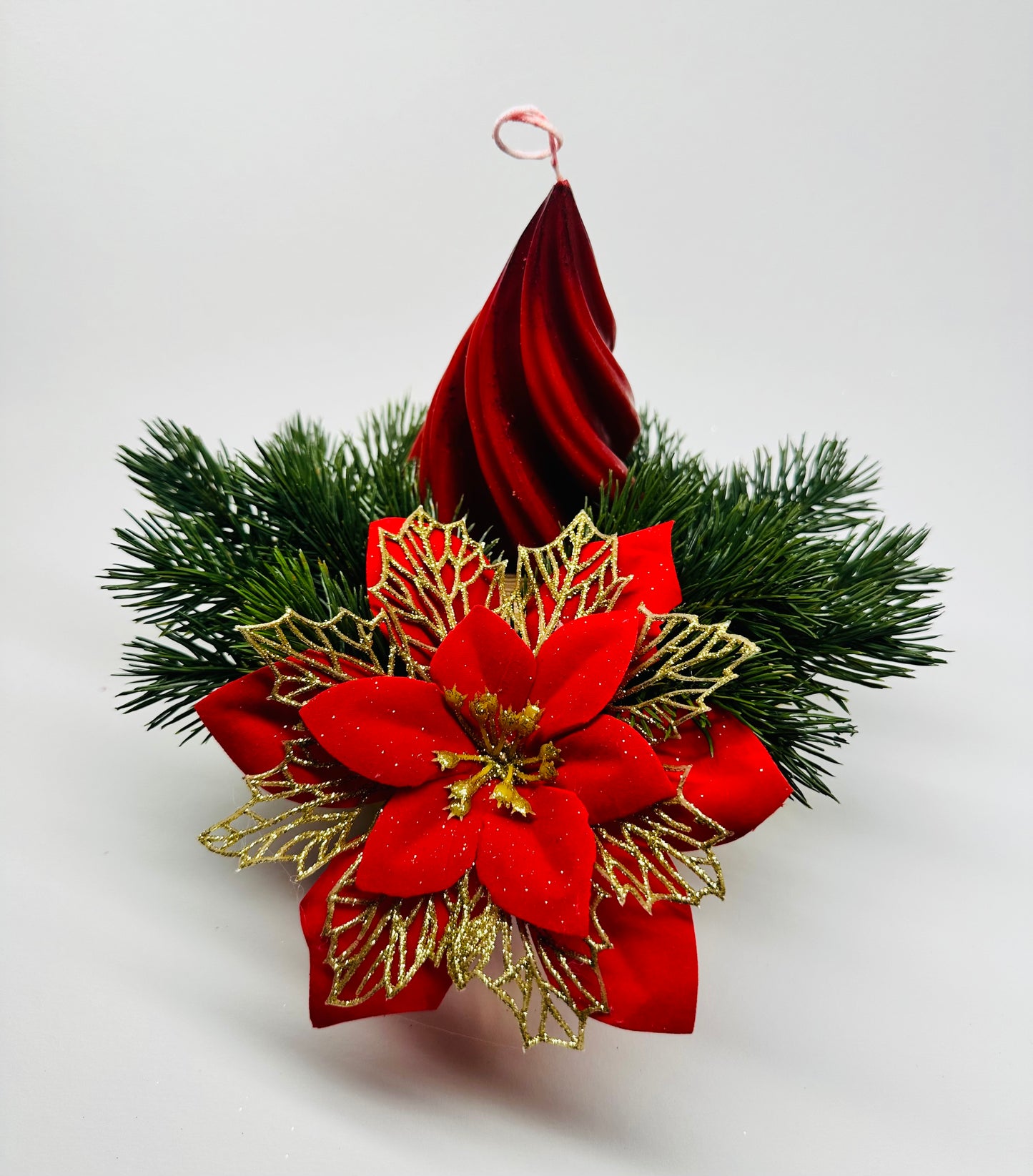 Centre de table de Noël avec bougie et poinsettia