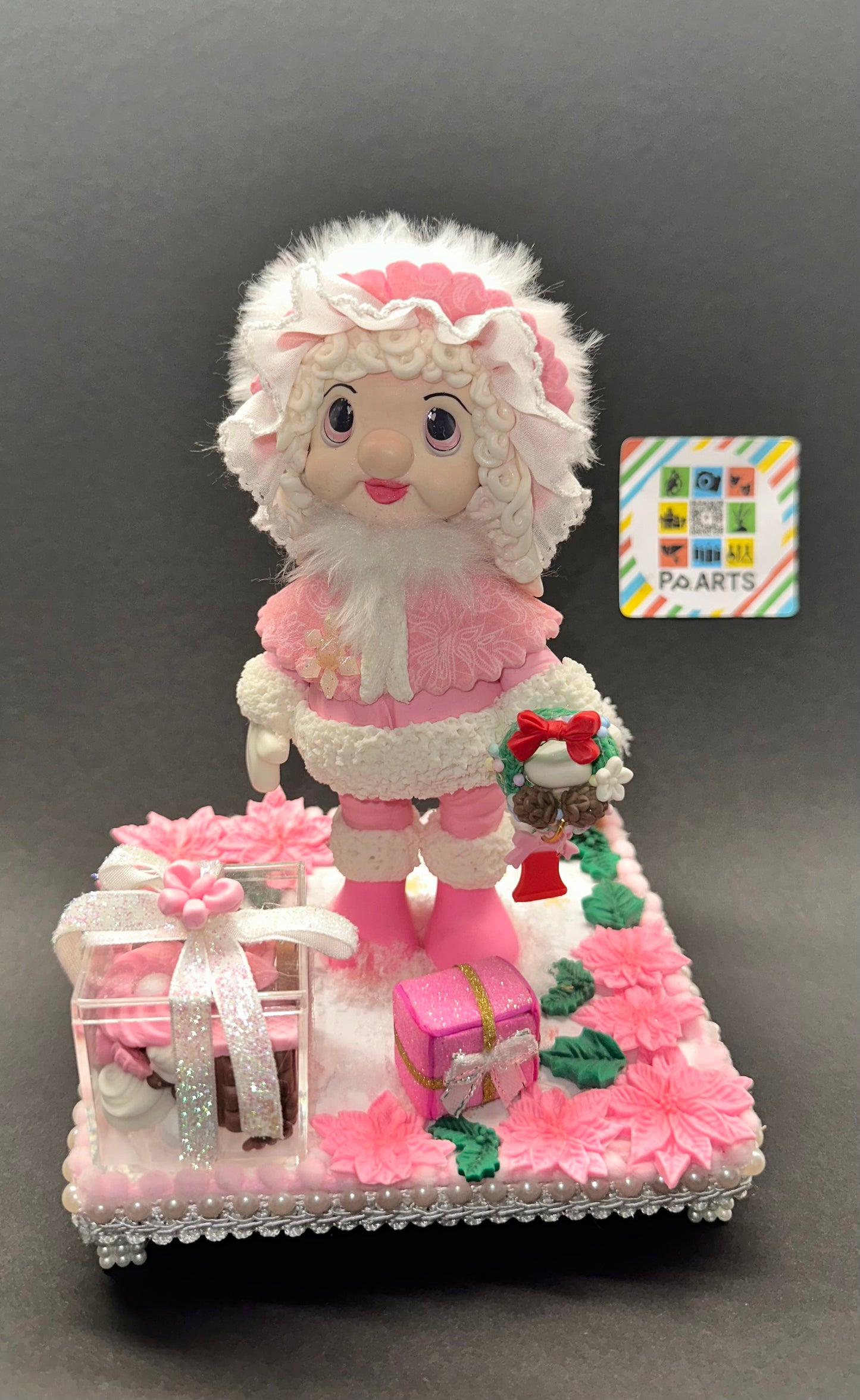 Decorative figurine “Christmas doll in pink”