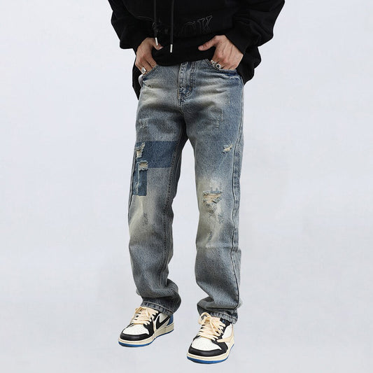 Jeans masculino rasgado retrô solto