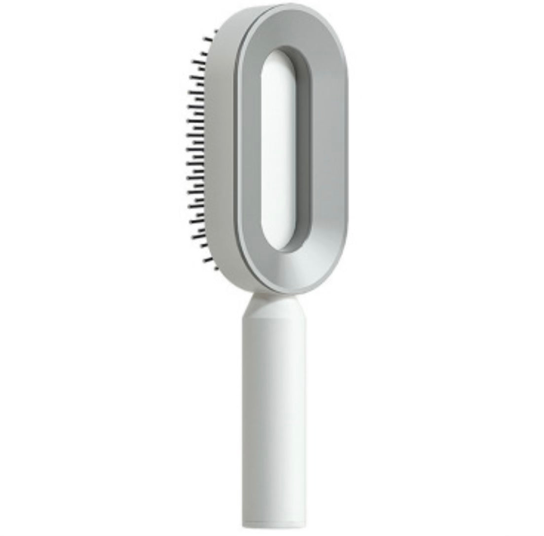 Brosse à cheveux autonettoyante