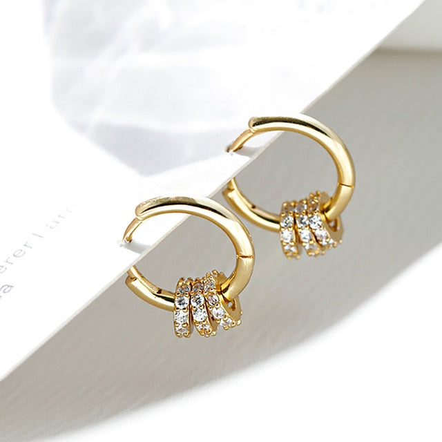 Boucles d'oreilles Huggie Hoop minimalistes en acier inoxydable