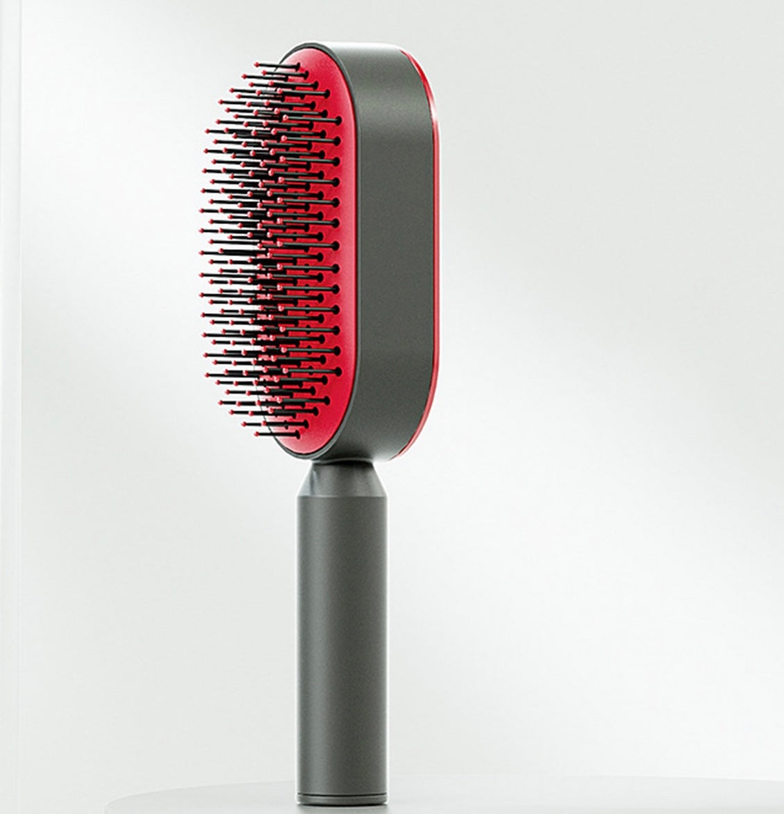 Brosse à cheveux autonettoyante