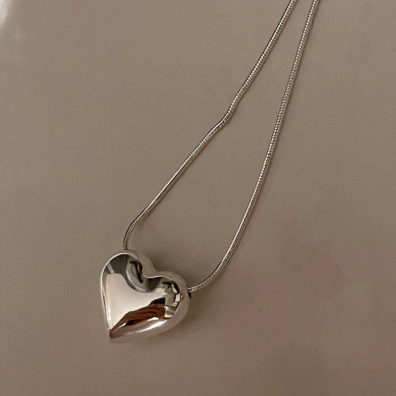 Collier pendentif coeur d'amour en métal