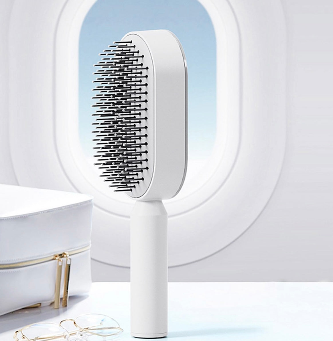 Brosse à cheveux autonettoyante