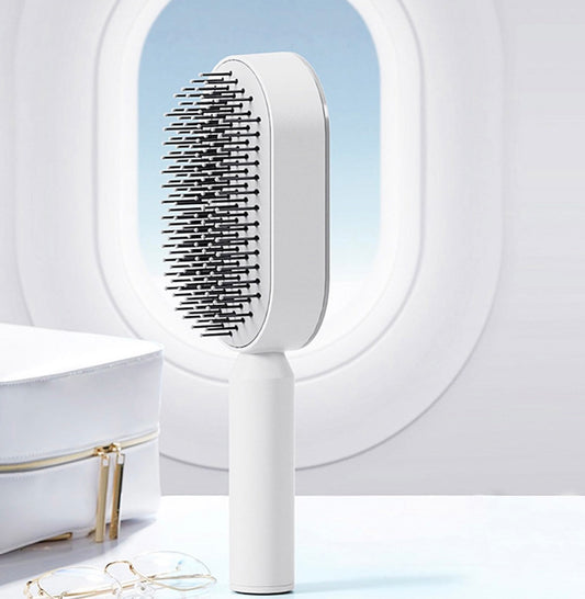 Brosse à cheveux autonettoyante